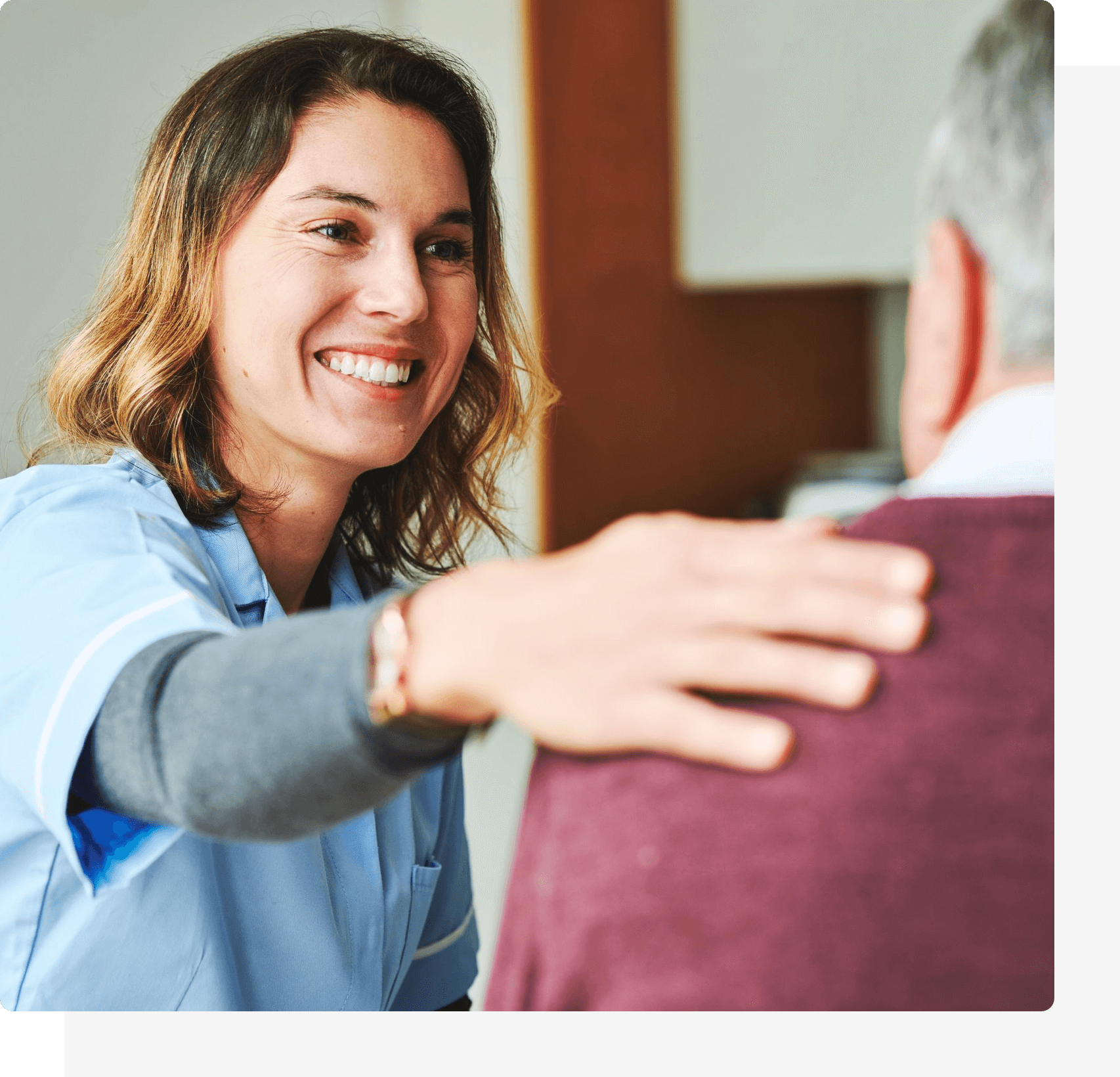 Our Mission and Philosophy. A medical assistant talking to it's patient
