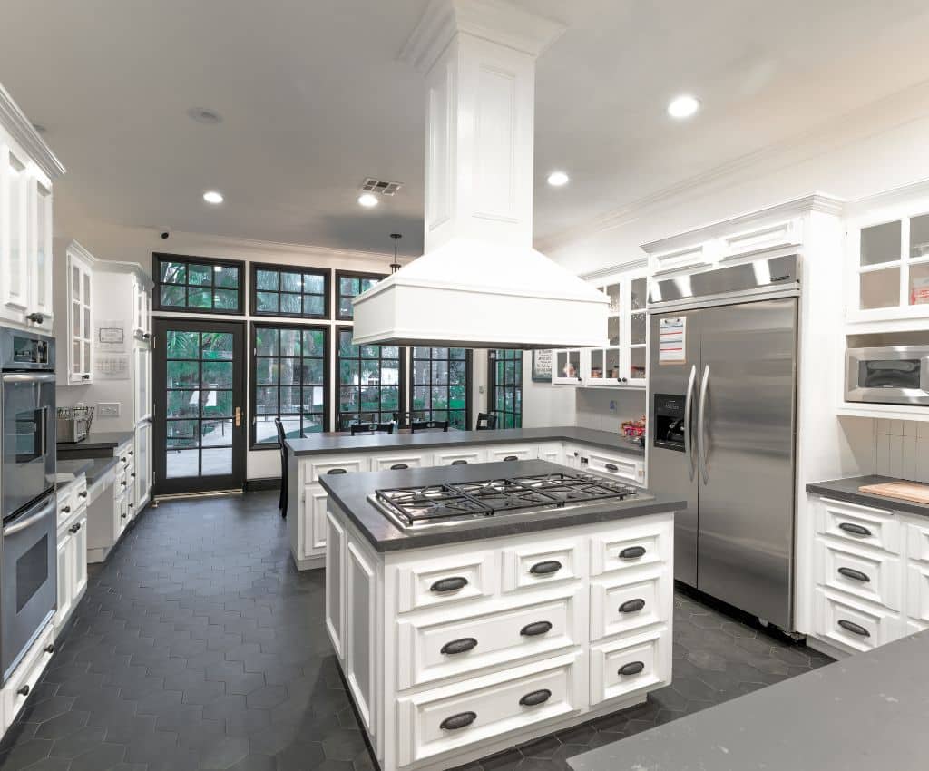 Image of 4 seasons Drug and Alcohol Rehab with white cabinets and a stainless steel fridge