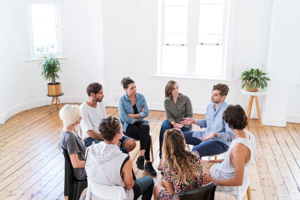 People in group therapy sitting in circle