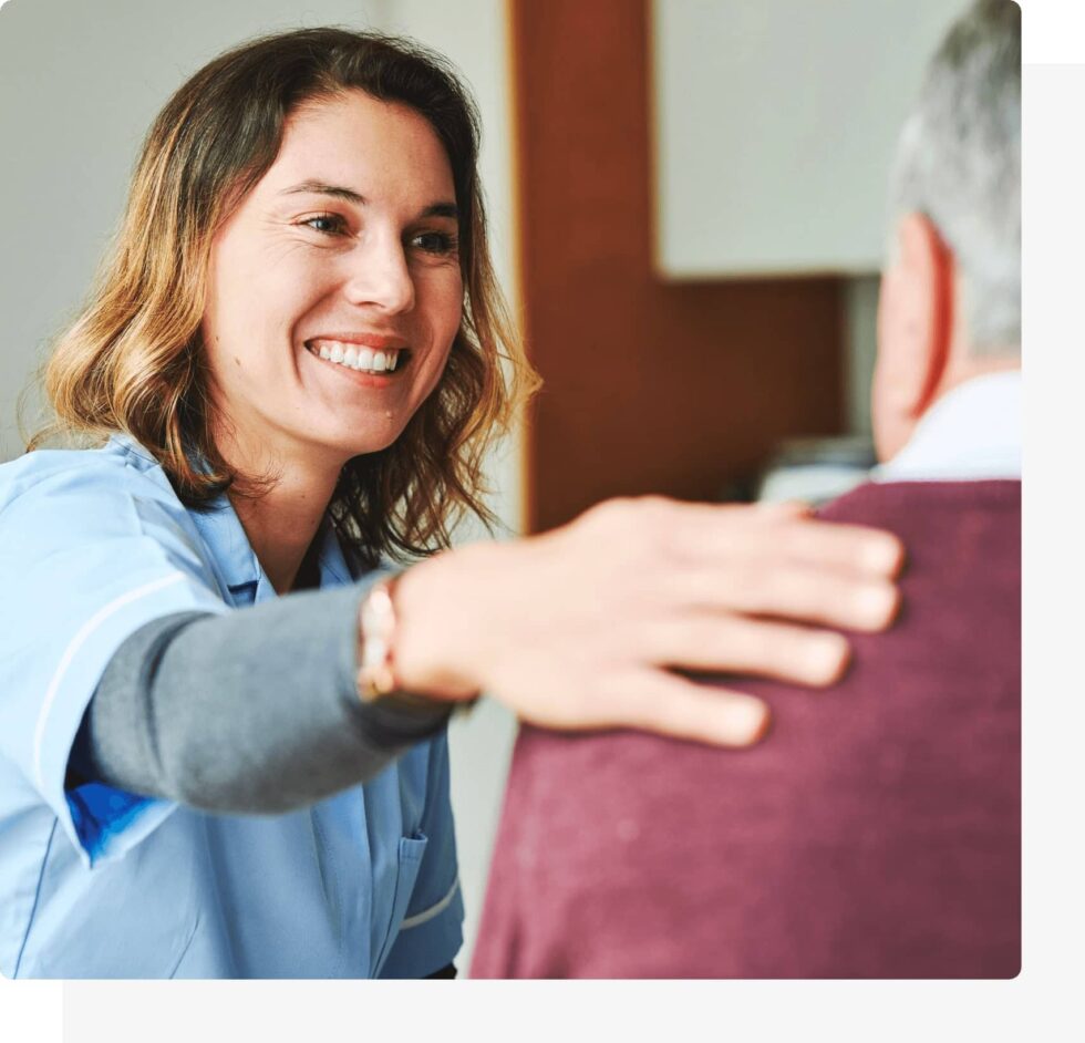 Smiling female doctor with a patient