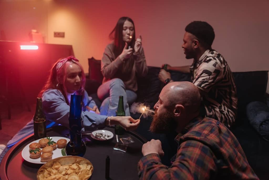 A group of teens smoking weed and using drugs