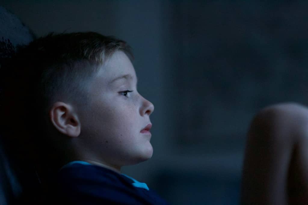 Young boy in dark