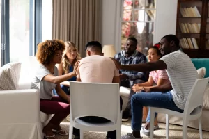 People meet at a support group for families of drug addicts.